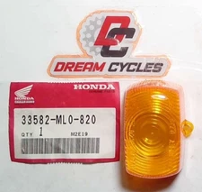 NOS HONDA 1990 CB125TT ENGINE PILOT LENS 33582-ML0-820 NEW OEM FACTORY ORIGINAL
