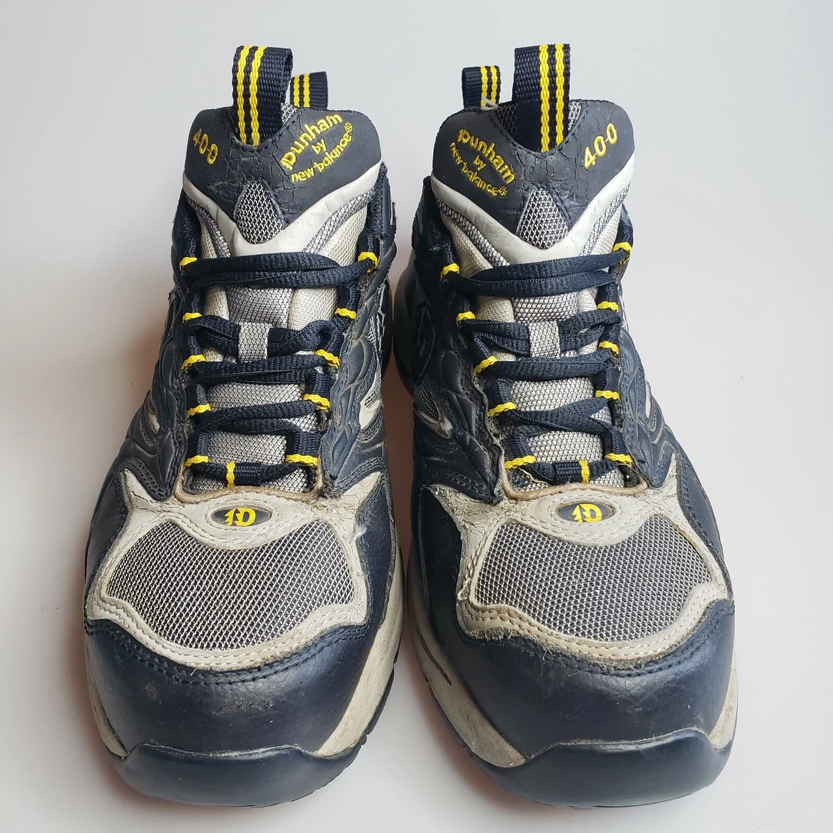 Dunham's track hotsell shoes