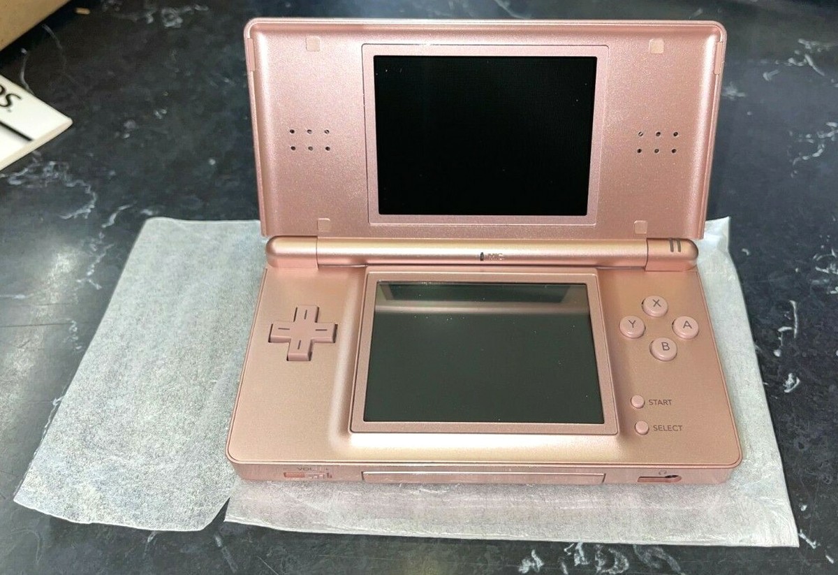 Nintendo DS Lite Metallic Rose Handheld System with an extra
