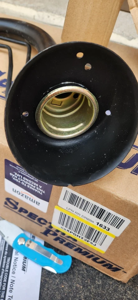 Cuello de llenado de tanque de combustible Spectra Premium FN1044 para Nissan Xterra 2000-2004 Foto 3 de 4