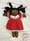 Vintage African American Cabbage Patch Kid doll, also known as a Little Person