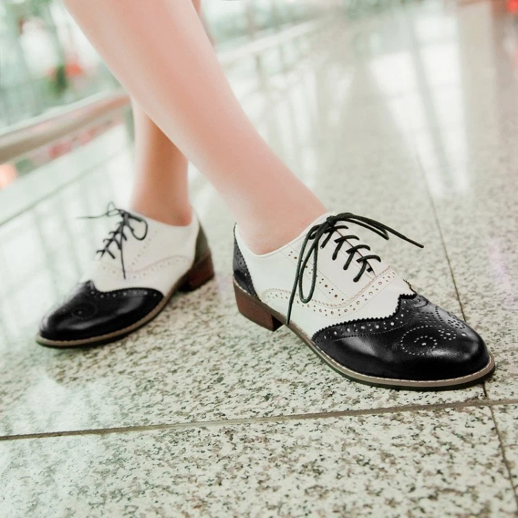 Ladies black and white brogues 2025