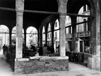 People browsing stalls under Loggia dei Cavalieri Treviso April 1954 Old Photo 1