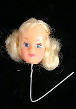 Vintage doll heads on pick. blonde. Blue eyes