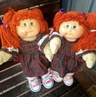 Two Vintage Cabbage Patch Girls With Red Hair. One Blue Eyed, One Green Eyed