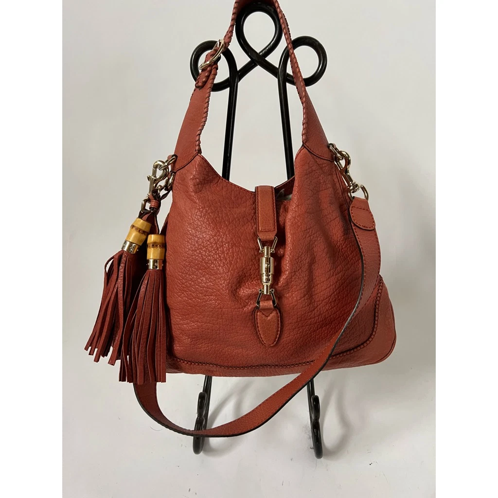 Jackie 1961 medium shoulder bag with appliqué in brown leather