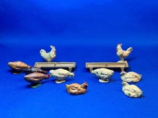 Group 10 Johillco Chickens sitting, pecking, strutting, plus 2 troughs