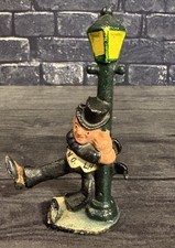 OLD SCHOOL LOOK HAND PAINTED CAST IRON BOTTLE...