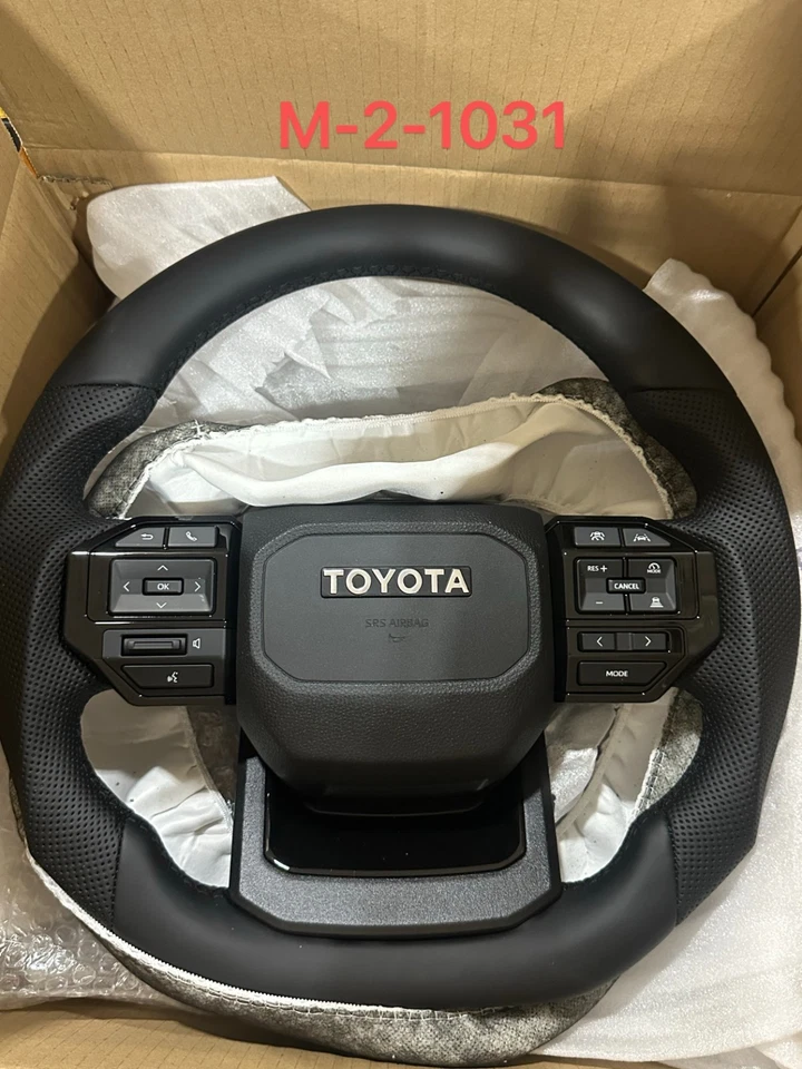 Volante carbono Toyota Land Cruiser/Hilux LC250 (M-2-1031)(M-4-1031) Foto 3 de 4