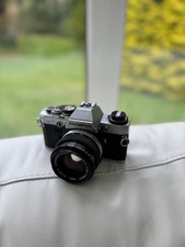 OLYMPUS OM10 WITH 50MM ZUIKO F1.8 LENS STRAP AND CASE