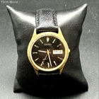 Vintage Seiko 7N43-8A99 Gold Tone Black Dial Day Date Watch Lizard Strap