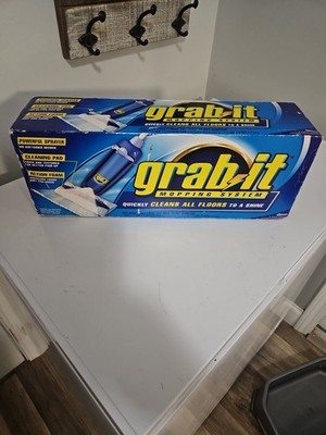 GRAB-IT MOPPING SYSTEM NEW IN BOX INCLUDES MOP, 6 CLEANING PADS, 1 FLOOR CLEANER