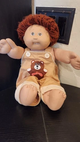 Vintage Cabbage Patch Boy Doll  Feom 1982. He Has Branded Teddy Bear Overalls