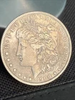 1900 o morgan silver dollar maybe O/cc?
