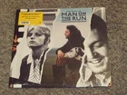 PAUL MCCARTNEY " MAN ON THE RUN" U.S . LP PRESSED ON ORANGE VINYL INCLUDES POSTE