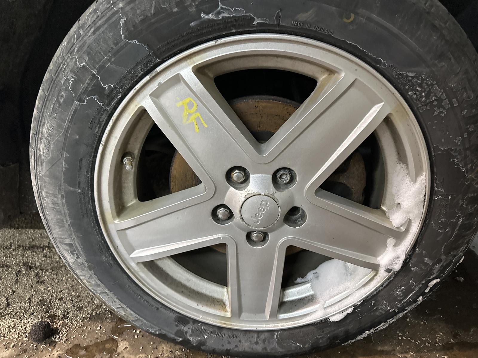 Used Wheel fits: 2008 Jeep Compass 17x6-1/2 alloy 5 spoke silver painted spokes