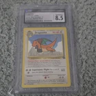 Pokémon Dragonite Black Star Promo 5 CGC 8.5 1999 Kids WB Stamped Card