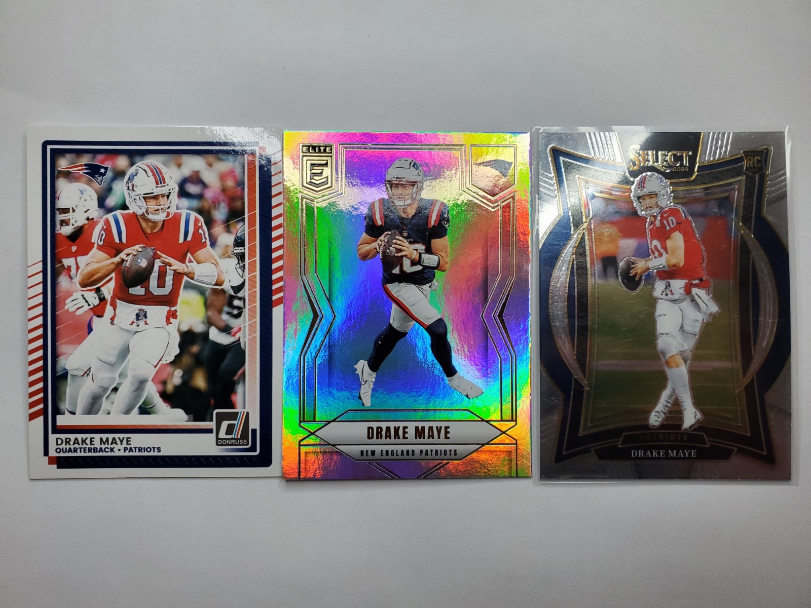 Drake Maye Card Lot: Donruss Elite Silver Refractor, Retro Jersey And Select RC