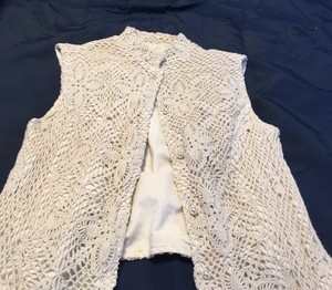 white crochet vest