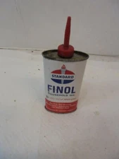 small tin finol household oil standard four ounce half full gas station decor 