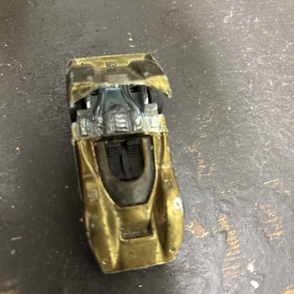 Hot Wheels 1968 Redline Mclaren M6A dorado Foto 3 de 4