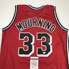 Autographed/Signed Alonzo Mourning Miami Red Basketball Jersey JSA COA
