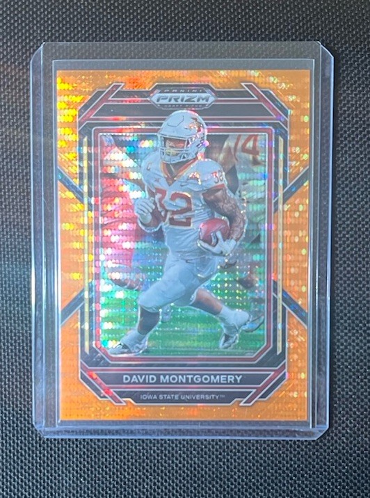 David Montgomery  #/49 2023 Panini Prizm Draft Picks #25 Prizms Orange Pulsar