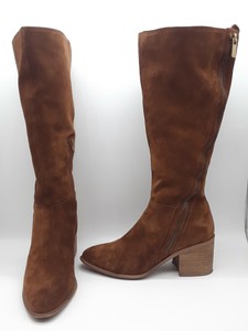 carlos santana riding boots