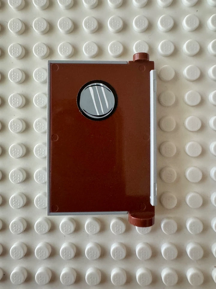 LEGO Puerta 1x4x5 Izquierda con Vidrio Marrón Rojizo con Ojo de Buey (Pegatina) 73436c04pb01 Foto 2 de 2