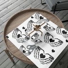 Gothic wrapping paper with black hearts