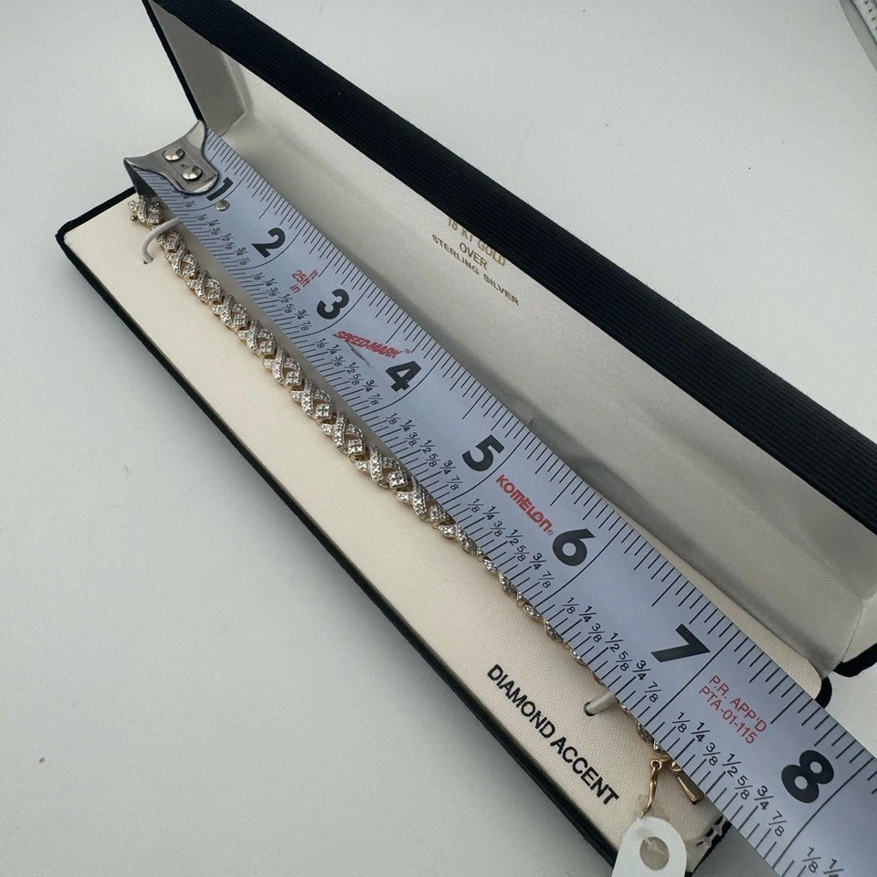 Elegante brazalete de oro y plata de 14 quilates con detalles de diamantes de ley nuevo en caja Foto 3 de 4