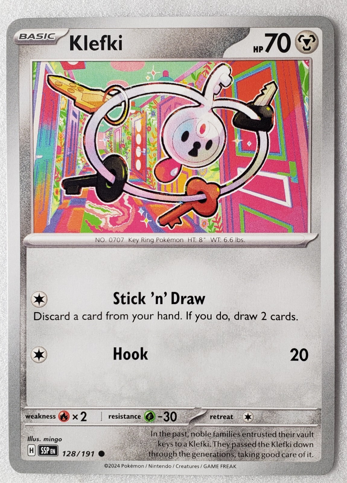Klefki 128/191 NM / M Surging Sparks Pokemon Card $2 Combined Ship