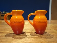 Le Creuset Stoneware Salt And Pepper Shakers Jug Pitcher Orange Flame Volcanic