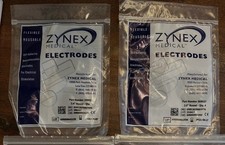 TWO Pack of 4 ZYNEX MEDICAL Electrodes 2" Round Pads Reusable 300027 SelfAdhere