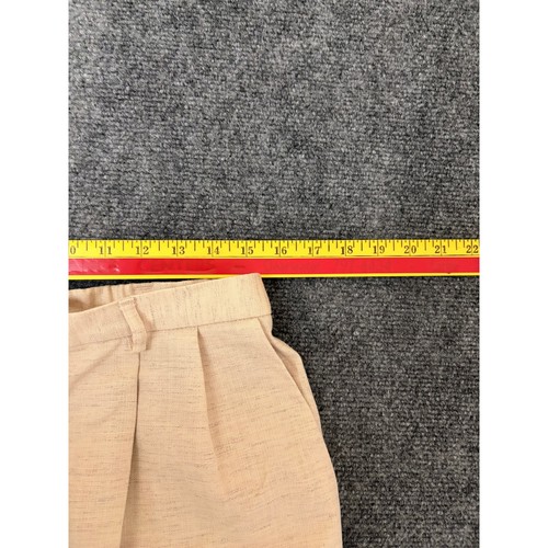 Tan VTG polyester blend pant suit with straight-leg cut, yellow measuring tape across the waistband.