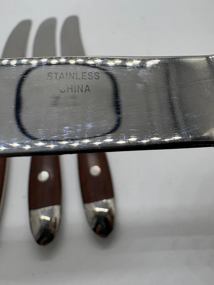 Lote De Colección De 4 Cuchillos De Cena Acero Inoxidable Aspecto Madera Mango Cubiertos Retro Foto 3 de 3