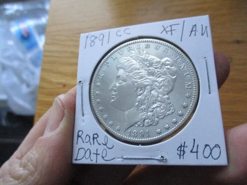 1891cc MORGAN SILVER DOLLAR  in VERY NICE WHITE XF to AU condition. RARE DATE!