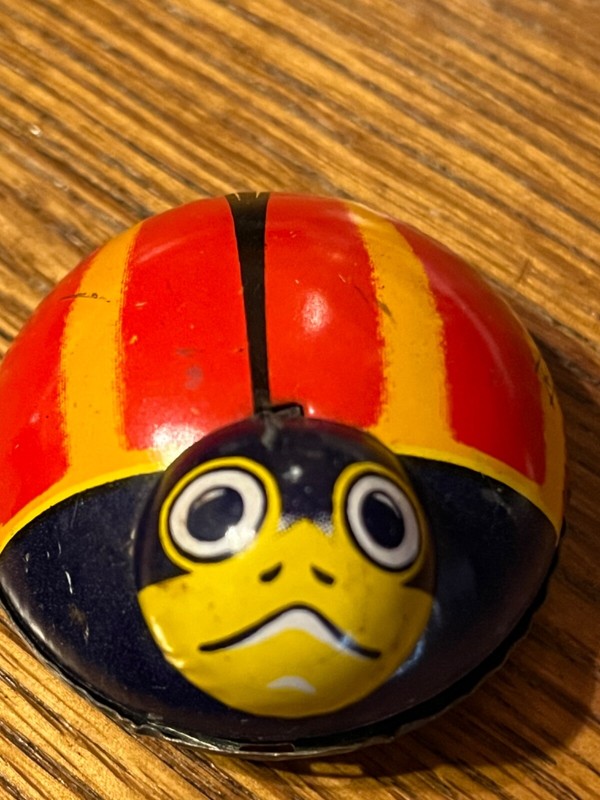 2 Vintage Japanese Tin Friction Ladybug and Yone friction lion you get both toys