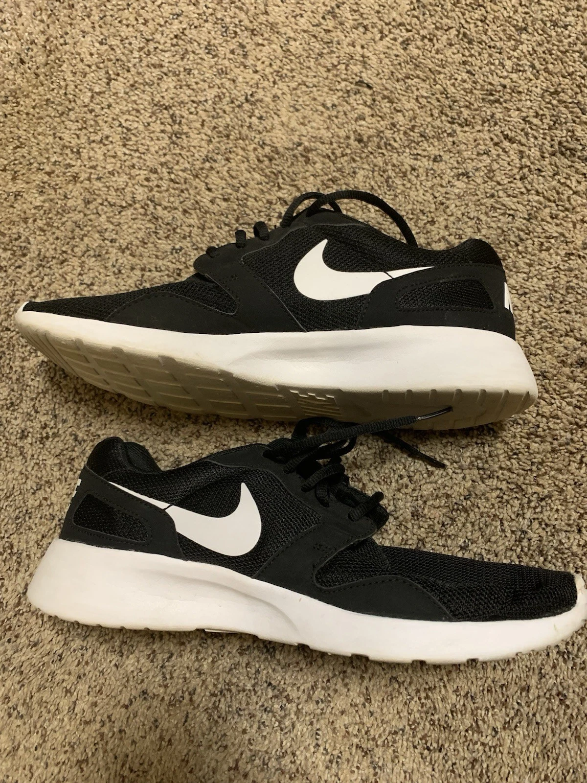 Sneakers sportive uomo Nike bianche e nere 11