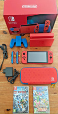 Console Nintendo Switch Edition Limitée Super Mario Rouge Et Bleu + 2 Jeux