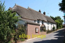 Photo 6x4 Sandford: Newbuildings Thatched cottages ? Staddlestones and Sh c2006
