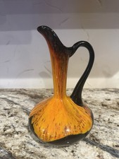 Genuine vintage Canuck Pottery 'Flame' lava glaze pitcher — that volcanic drip glaze is pure 1960s-70s MCM magic in perfect condition.