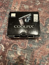 Nikon COOLPIX L20 10.0MP Digital Camera, Deep Red - Parts/Repair Battery Prong