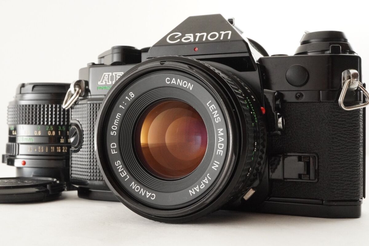Canon AE-1 PROGRAM Black + NEW FD 50mm F1.8 + NEW FD 28mm F2 Canon AE-1 PROGRAM Black + NEW FD 50mm F1.8 + NEW FD 28mm F2