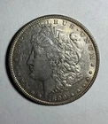 1899 Morgan Silver Dollar $1 Coin - 90% Silver.  No mint mark.  Philadelphia.