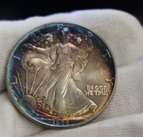 Super Toner 1986 US Silver Eagle $1 Nice Unc Key Date.