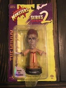 little figurines with big heads