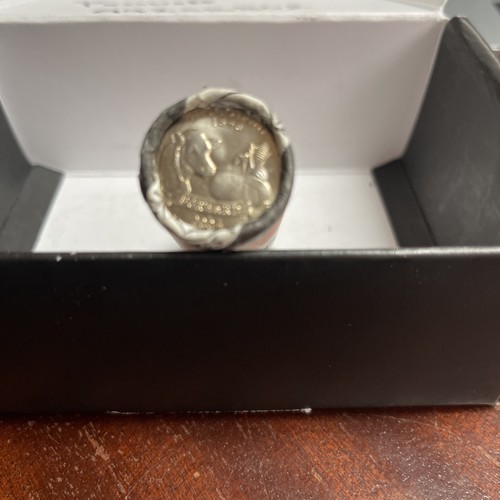 roll of uncirculated Wisconsin quarters