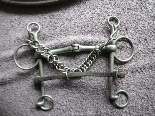 5 1/2 " jointed pelham with leather lip strap and curb chain used