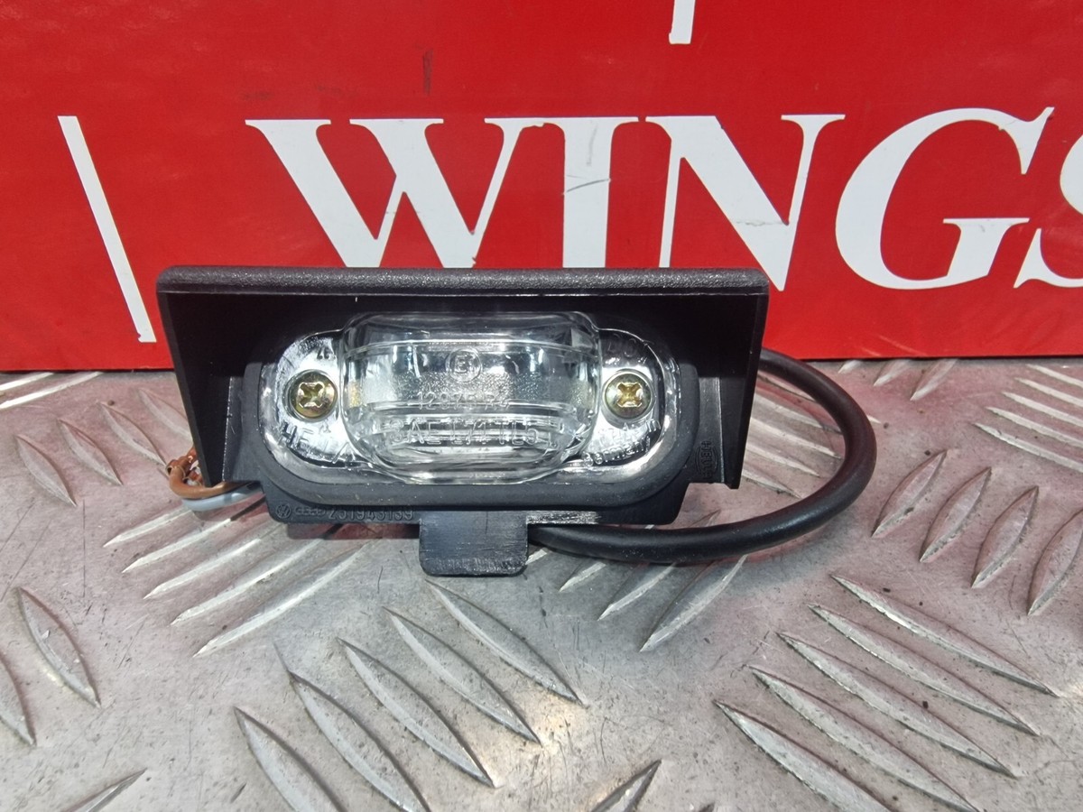 NEW GENUINE VW TRANSPORTER T3 REAR NUMBER PLATE LIGHT 1979-1991